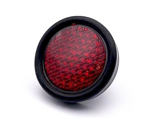 Odrazka 65mm kulatá červená ochranná gumová objímka.